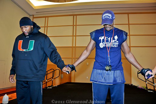 Lewis and Sanders pray together before working out. Photo credit: Glenwood Jackson (2011)